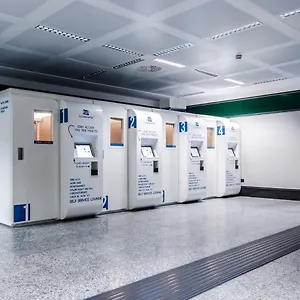Capsule hotel Resting Pods - -zzzleepandgo Mxp Airport, Ferno